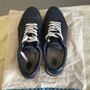 Navy Blue gently used Tory Sport Golf shoes. Leather-nylon upper, rubber sole.